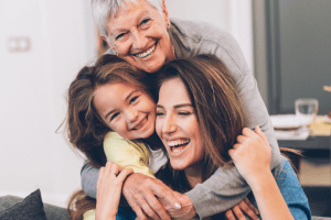 three generations of women with healthy skin