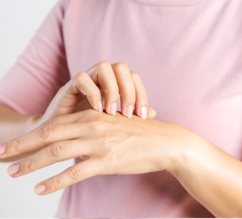 Learn More About Atopic Dermatitis Today! - Skin Care Physicians women with itchy skin from atopic dermatitis
